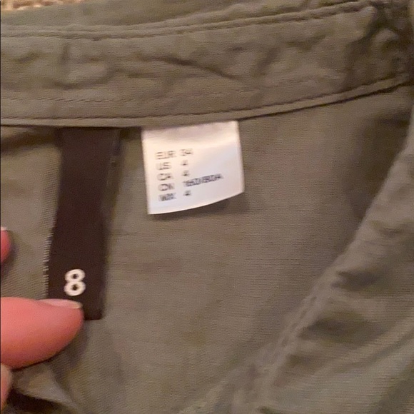 Dark green button up shirt. - Picture 2 of 3